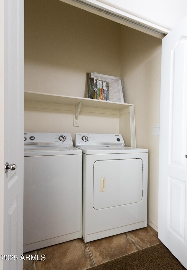 laundry area with washer and clothes dryer