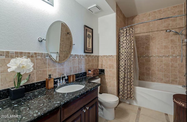 5335 E Shea Blvd Unit 2081, Scottsdale, AZ 85254 - full bath with toilet, vanity, tile walls, shower / bath combination with curtain, and tile patterned floors