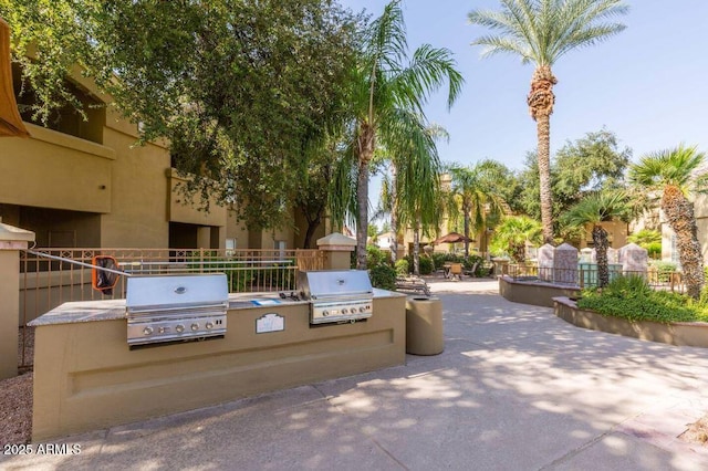 5335 E Shea Blvd Unit 2081, Scottsdale, AZ 85254 - view of home's community featuring an outdoor kitchen and a patio