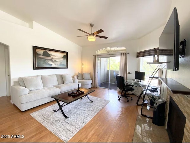 5335 E Shea Blvd Unit 2081, Scottsdale, AZ 85254 - living area featuring light wood-style flooring, a ceiling fan, a desk, and vaulted ceiling
