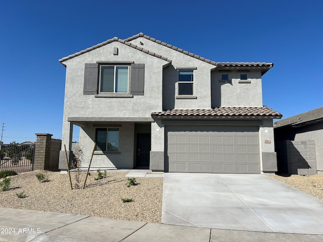 view of front of home with a garage