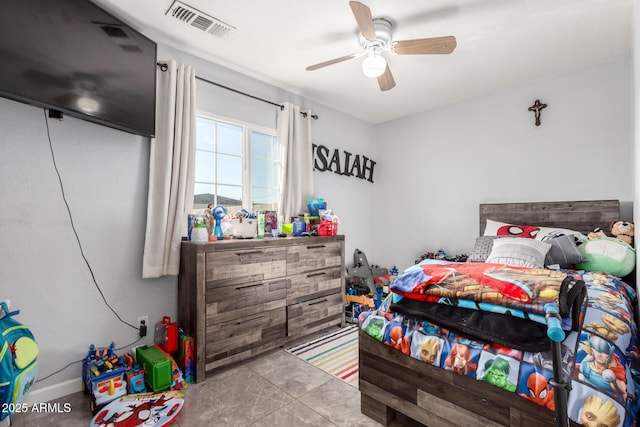 bedroom with visible vents and a ceiling fan