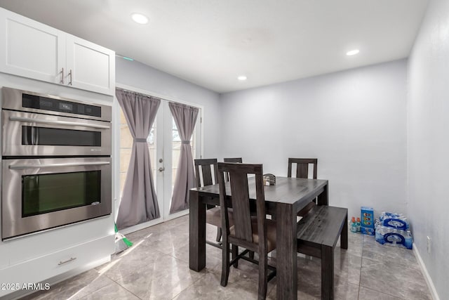 dining area with recessed lighting and baseboards