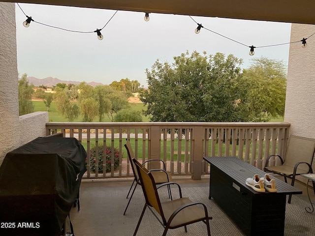 balcony featuring a grill and a mountain view