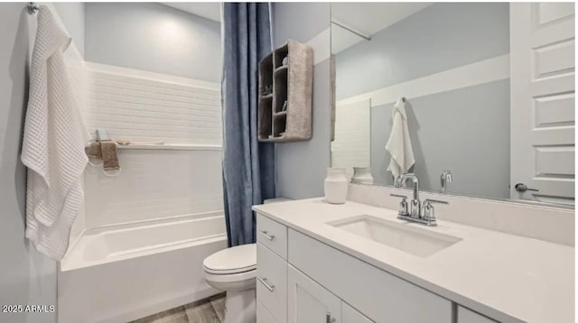 1516 W Ridge Rd, Apache Junction, AZ 85120 - bathroom featuring toilet, shower / bathtub combination with curtain, vanity, and wood finished floors