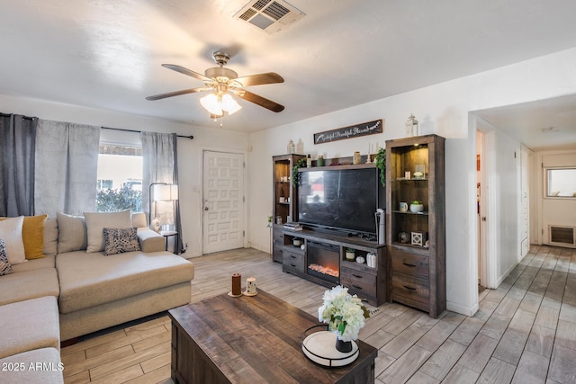 living room with ceiling fan