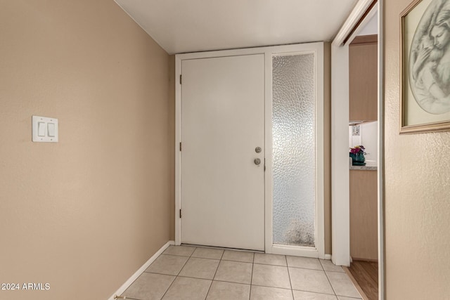 entryway featuring light tile patterned floors