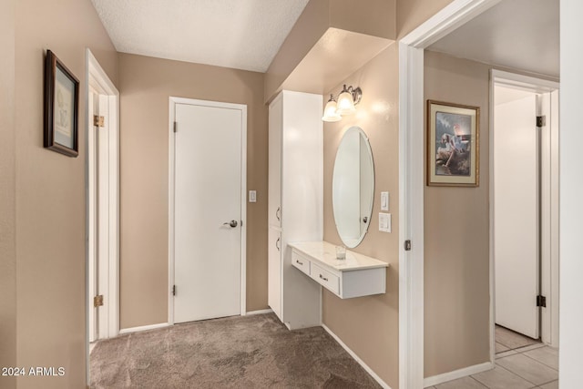 bathroom featuring a textured ceiling