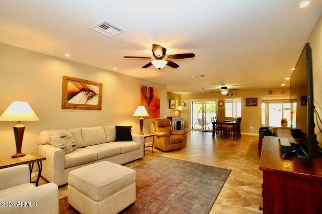 living room with ceiling fan