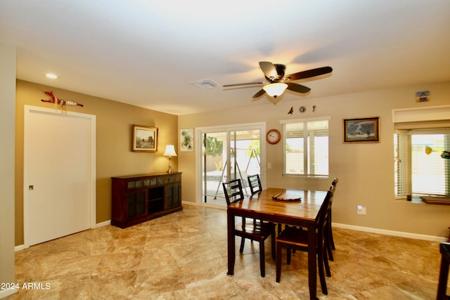 dining area with ceiling fan