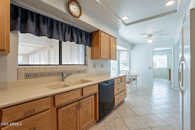 kitchen featuring sink, light tile patterned floors, ceiling fan, dishwasher, and white fridge