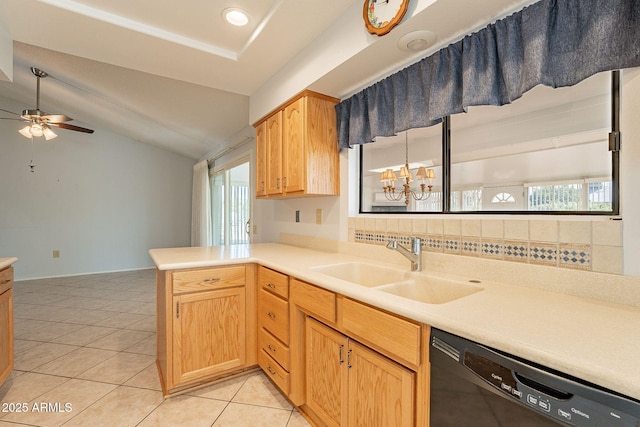 kitchen featuring lofted ceiling, black dishwasher, sink, light tile patterned floors, and kitchen peninsula