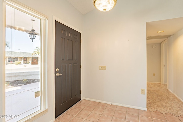 view of tiled foyer entrance