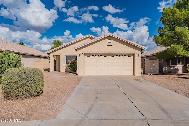 single story home with a garage