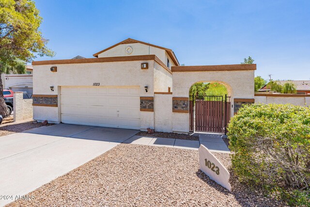 view of front of home with a garage