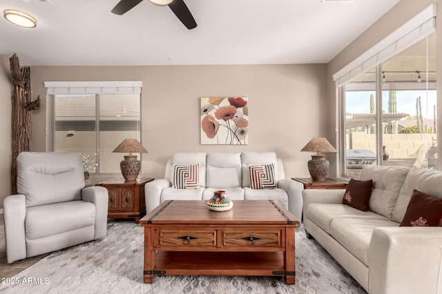 living room featuring ceiling fan