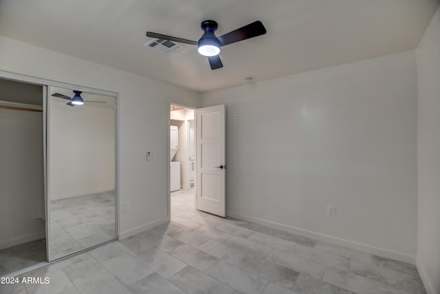 unfurnished bedroom featuring a closet, ceiling fan, and light tile flooring