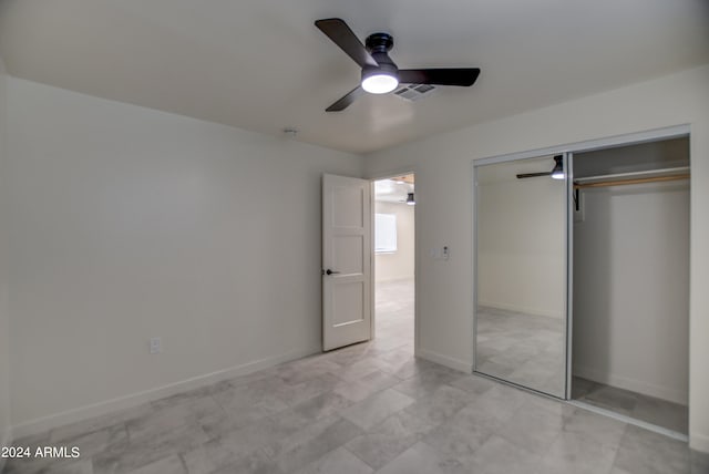 unfurnished bedroom featuring a closet, ceiling fan, and light tile flooring