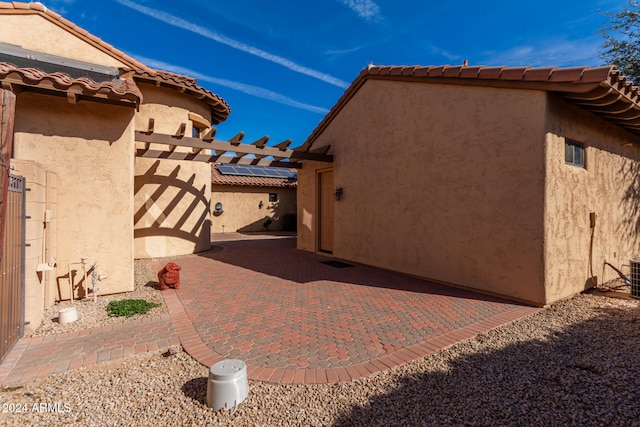 view of home's exterior featuring a patio