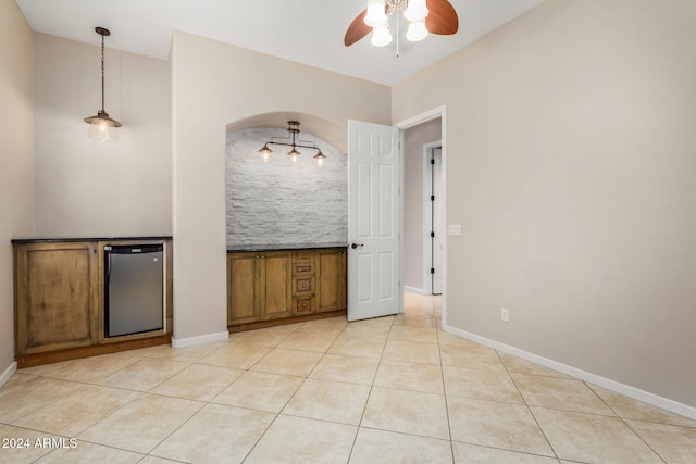 interior space featuring ceiling fan