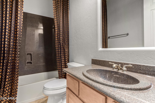 full bathroom featuring tile patterned floors, vanity, shower / bath combo, and toilet