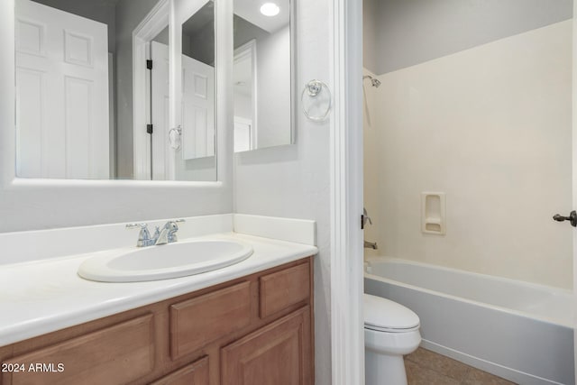 full bathroom with tile patterned flooring, vanity, bathing tub / shower combination, and toilet