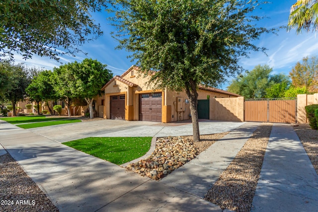 view of front of property with a garage