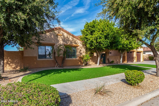 view of front of house with a front yard