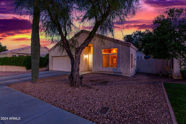 10735 W Bermuda Dr, Avondale, AZ 85392 - view of front of property featuring driveway, stucco siding, and a garage