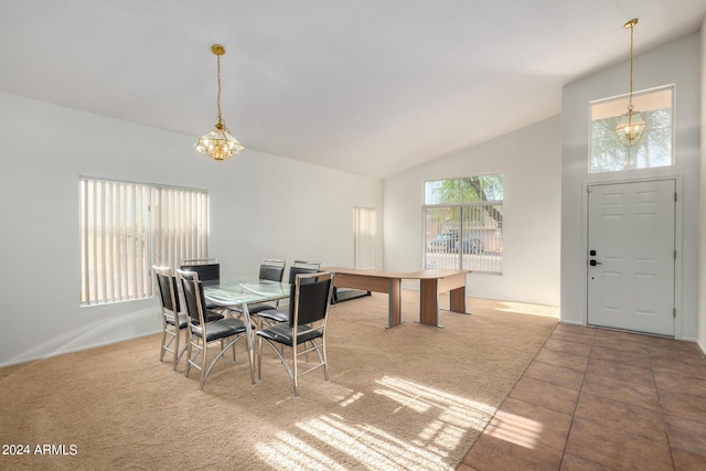 10735 W Bermuda Dr, Avondale, AZ 85392 - carpeted dining area featuring vaulted ceiling and a chandelier