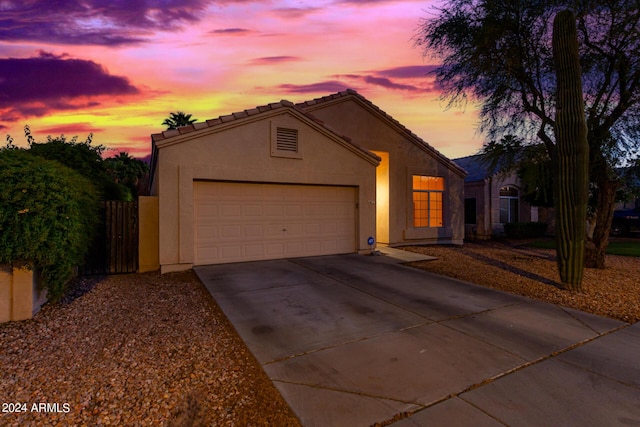 10735 W Bermuda Dr, Avondale, AZ 85392 - ranch-style house featuring stucco siding, a garage, concrete driveway, and fence