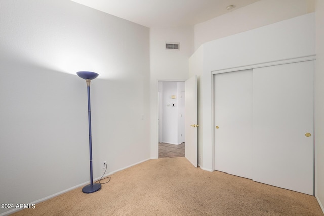 10735 W Bermuda Dr, Avondale, AZ 85392 - unfurnished bedroom featuring carpet, a closet, and baseboards