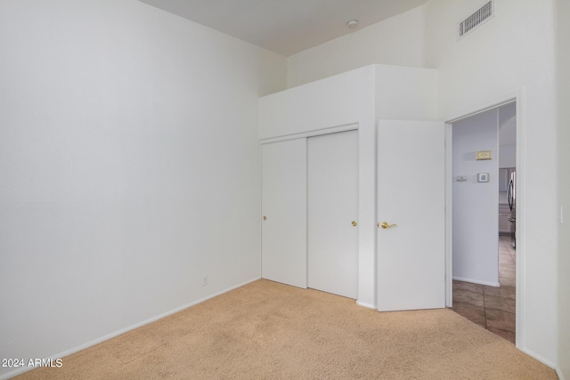 10735 W Bermuda Dr, Avondale, AZ 85392 - unfurnished bedroom featuring carpet, a closet, and baseboards