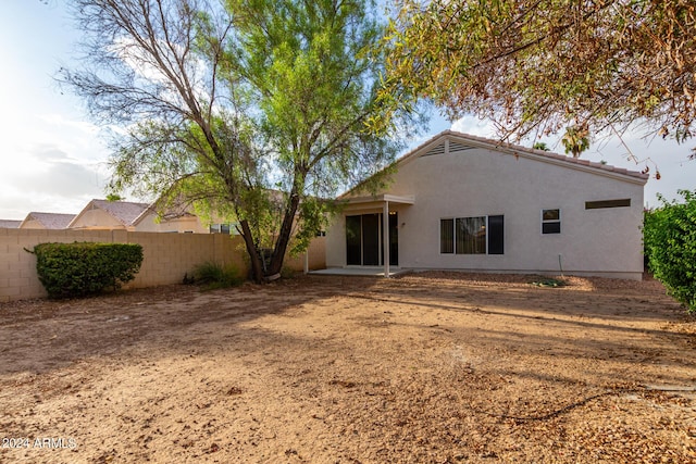 10735 W Bermuda Dr, Avondale, AZ 85392 - back of house featuring fence and stucco siding