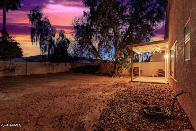 10735 W Bermuda Dr, Avondale, AZ 85392 - fenced backyard featuring a patio area