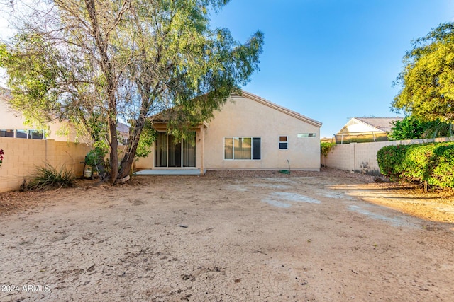 10735 W Bermuda Dr, Avondale, AZ 85392 - back of property featuring stucco siding and a fenced backyard