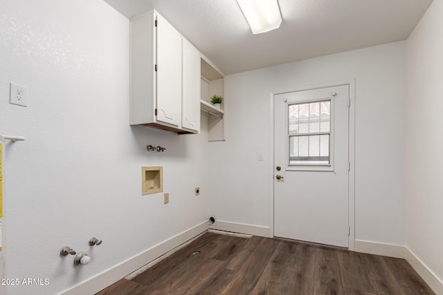 clothes washing area featuring hookup for a washing machine, cabinet space, dark wood-type flooring, electric dryer hookup, and baseboards