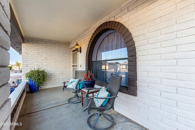 view of patio / terrace with a balcony