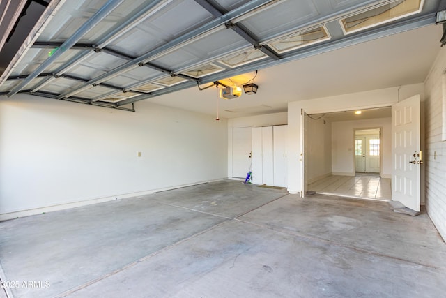 garage featuring a garage door opener