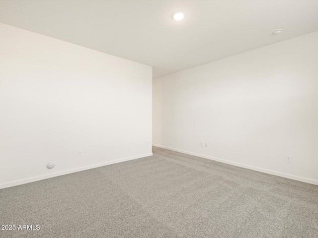 spare room featuring carpet flooring