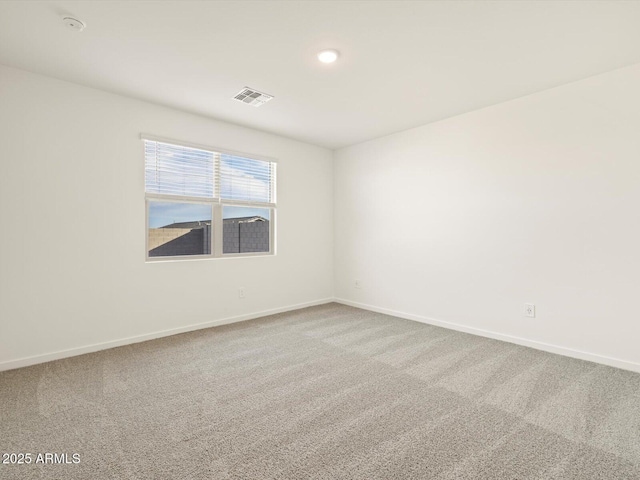 spare room with carpet