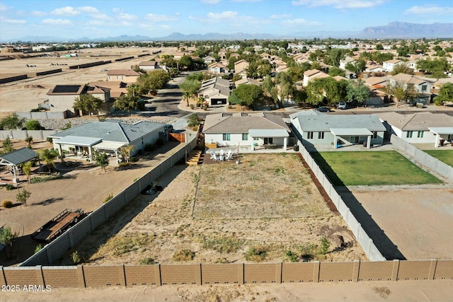 bird's eye view featuring a residential view and a mountain view