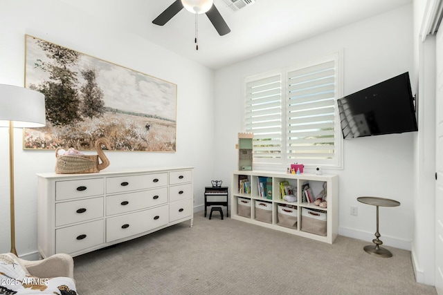 rec room with a ceiling fan, carpet, visible vents, and baseboards