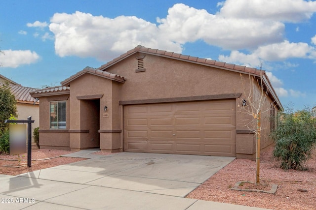 view of front of home with a garage