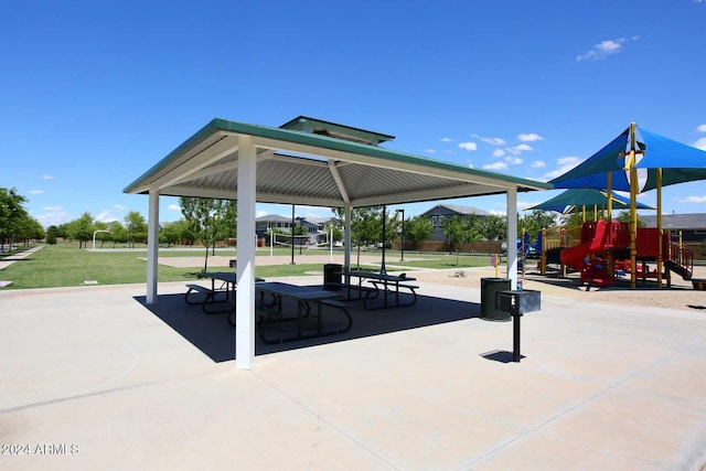 view of property's community featuring a playground, basketball court, and a gazebo