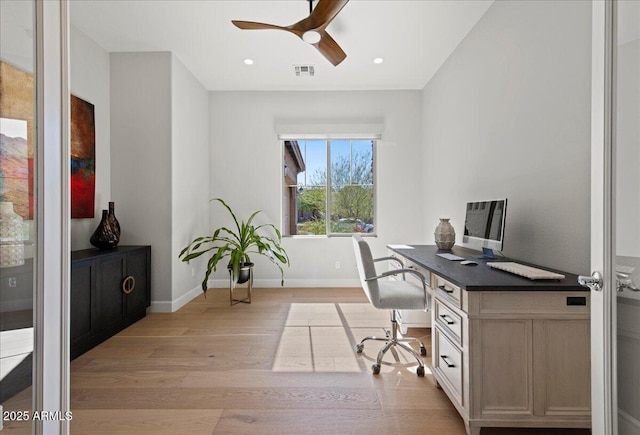 office area with visible vents, light wood finished floors, baseboards, recessed lighting, and a ceiling fan