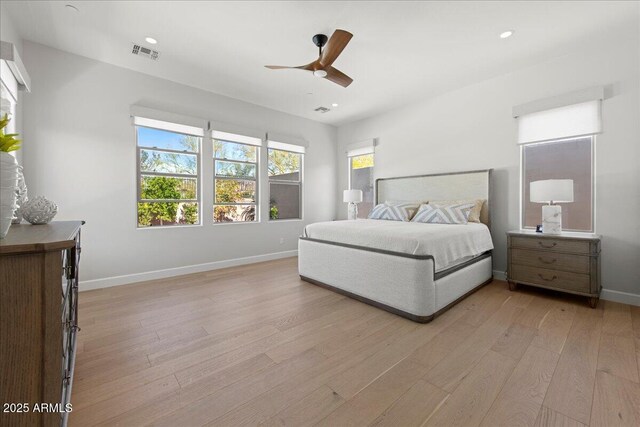 bedroom featuring recessed lighting, baseboards, light wood-style floors, ceiling fan, and visible vents