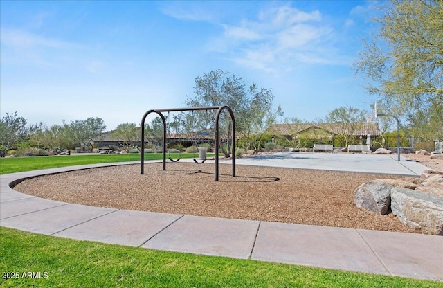 community play area with a lawn