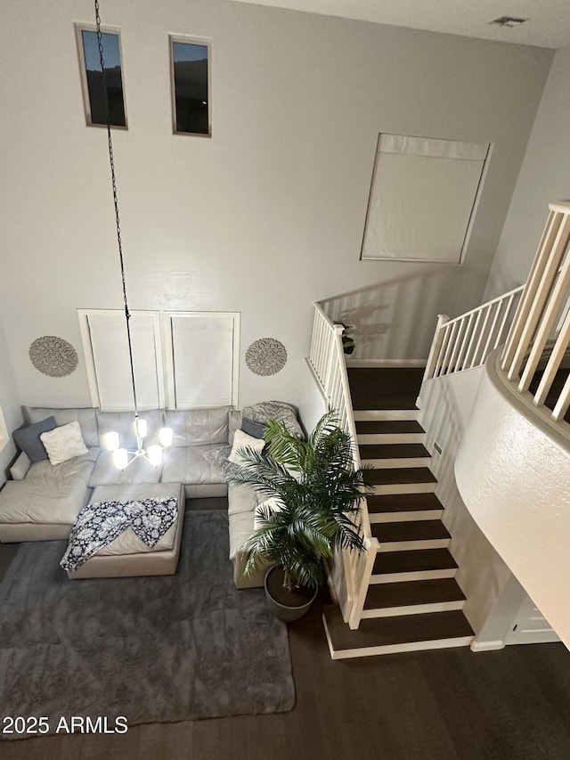 stairway with wood finished floors