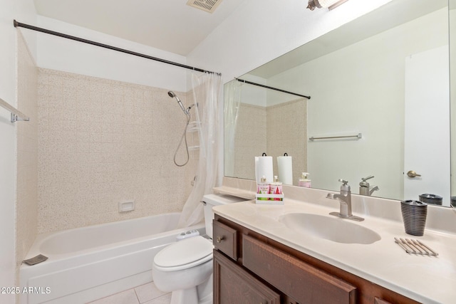 full bathroom featuring vanity, shower / bath combo, tile patterned floors, and toilet